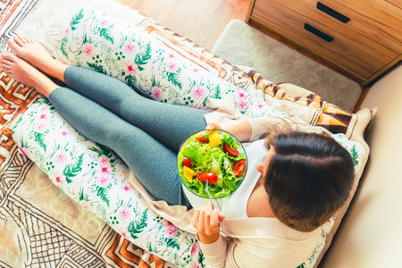 Pregnant healthy eating salad. Pregnancy woman eating nutrition healthy food. healthy breakfast conceptの写真素材