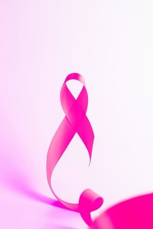 Cancer awareness. Health care symbol pink ribbon on white background. Breast woman support concept. World cancer dayの写真素材