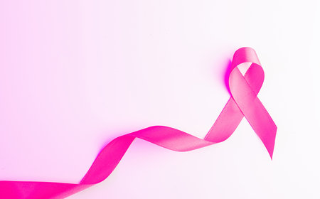 Cancer awareness. Health care symbol pink ribbon on white background. Breast woman support concept. World cancer dayの写真素材