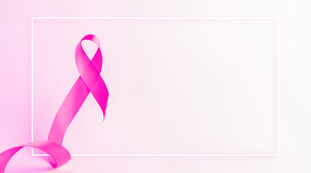 Cancer awareness. Health care symbol pink ribbon on white background. Breast woman support concept. World cancer day.の写真素材