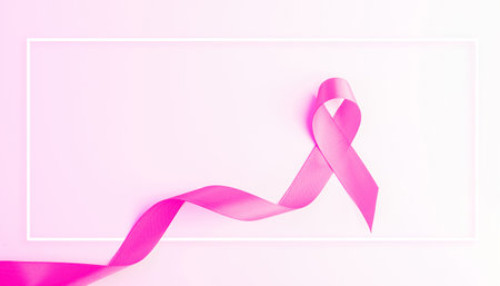 Cancer ribbon. Health care symbol pink ribbon on white background. Breast cancer woman support concept. World cancer day.の写真素材