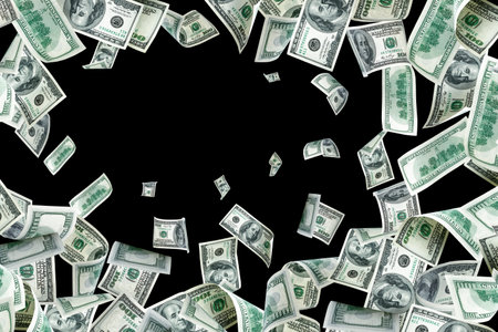 Money stack. Hundred dollars of America. Falling money isolated, us bill black background.の写真素材