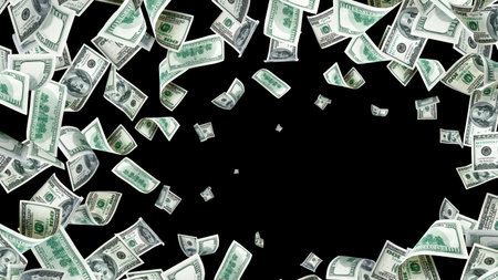 Hundred dollar bill. Falling money isolated on black background. American cash.の写真素材