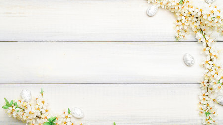 Easter eggs wood. April floral nature, white happy easter eggs on wood spring background. Easter pattern with place for textの写真素材