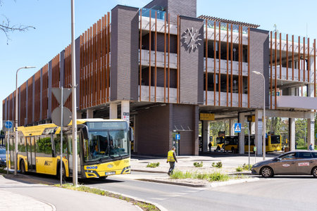 ZABRZE, POLAND - APRIL 28, 2026: Urban transit center Zabrze Poland pedestrians and buses.