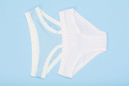 Couple of cotton panties on blue