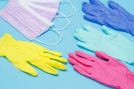 Different colors latex gloves and medical masks for personal protection.の写真素材