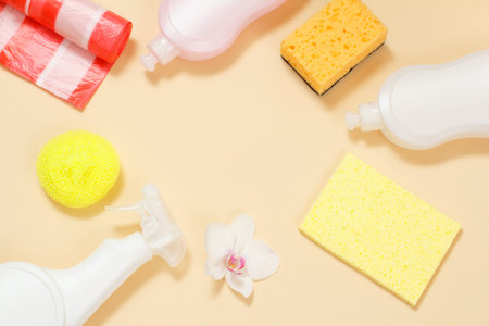 Plastic bottles of dishwashing liquid, glass and tile cleaner, detergent for microwave ovens and...