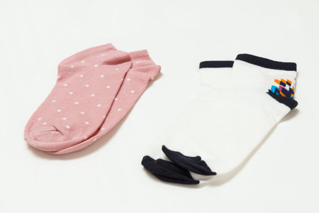 Two pair of women socks on a white background.