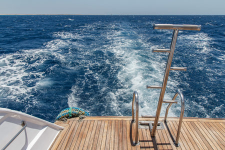 View from the stern of the yacht while sailing on the sea. Travel and vacation concept.