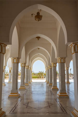 SHARM EL SHEIKH, EGYPT - JUNE 3, 2021: Al-Salam Mosque in Sharm El-Sheikh in Egypt. Inside view of arched windows in mosque with a bright interiorのeditorial素材