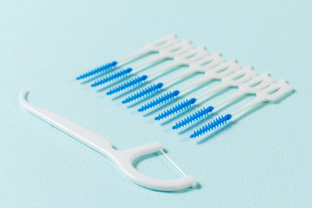 Close-up interdental brushes on the blue background