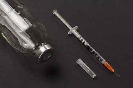 Plastic syringe and bottle for liquid medicine.の写真素材