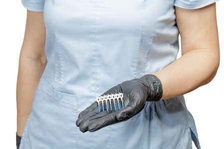 Female dentist in latex gloves with the interdental toothpick brushes.の写真素材