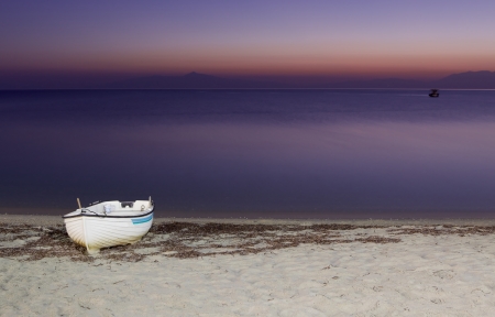 A fishing boat at a seasideの写真素材