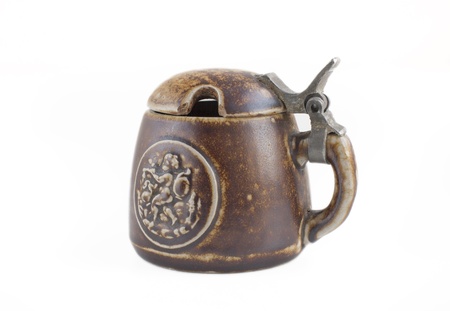 An old antique mustard potの写真素材