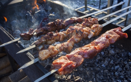 Pork and lamb kebab with pepper and spice on the BBQ の写真素材
