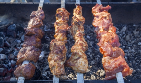 Pork and lamp kebab with pepper and spice on the BBQ の写真素材