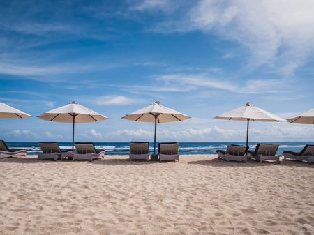 Chairs And Umbrella on the beach. Tropical Holidayの写真素材