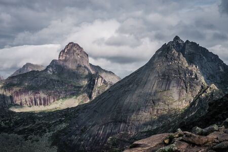 View of a mountain valley on a cloudy day, on top. Siberiaの写真素材