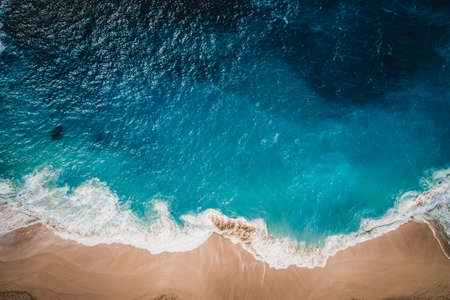 View of the ocean and wild beach from aboveの写真素材