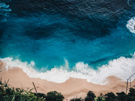 View of the ocean and wild beach from aboveの写真素材