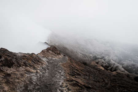 The road around active volcano Bromo, Indonesia, East Java. The edge of volcano craterの写真素材