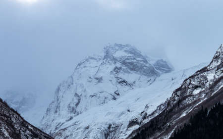 Mountain top surrounded by clouds. Greater Caucasus ridgeの写真素材