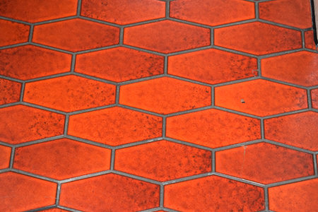 Orange and red ceramic brick floor texture. Abstract background and texture for design.の写真素材