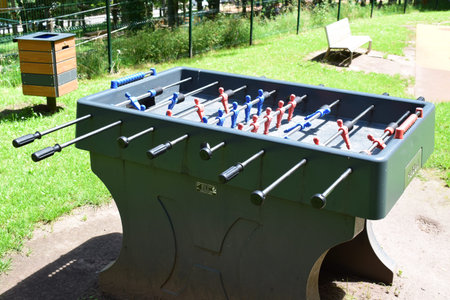 Table football in the children's park. Equipment for playing table football.
