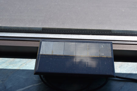 Solar panel installed on the roof of the building, close-upの写真素材