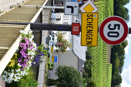 Traffic sign on the street of Schengen, Luxebourg when entering village and country from the German...