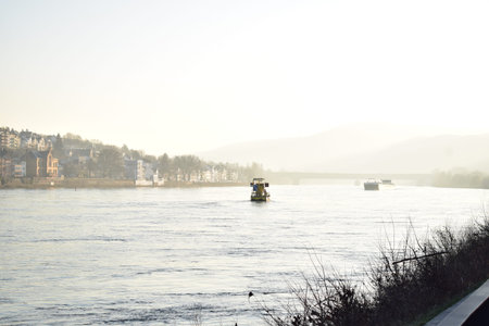 Boat on the Rhine approaching the Pfaffendorfer BrÃ¼cke construction site, Koblenz