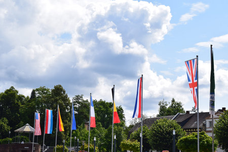 Flags of the EU countries on a sunny day.