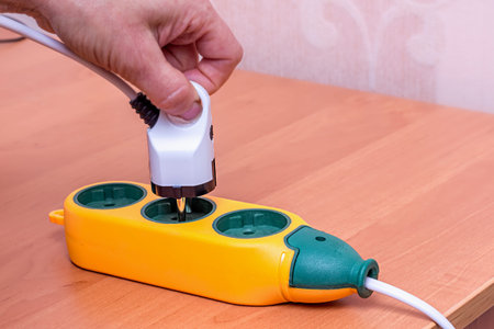 installation of a new outlet with a screwdriver, electrical work