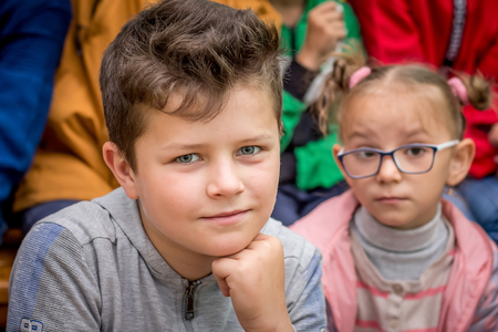 Ukraine. Khmelnytsky region. June 2018. Children with curiosity watch  show,  circus number, listen to storyのeditorial素材