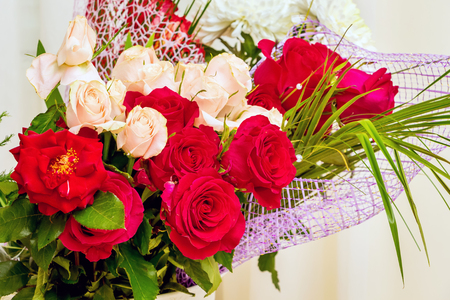 Bouquet of red and pink roses for greetings. Roses - a great gift for brides. Growing and selling rosesの写真素材