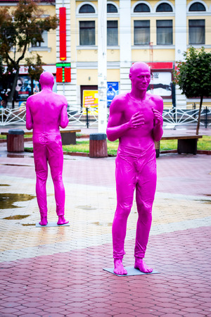 Khmelnytskyi. Ukraine.  October 2018. Sculptures by V. Sidorenko. Sculptures of people of pink colorのeditorial素材
