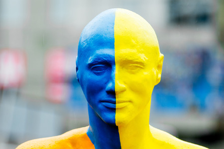 Khmelnytskyi. Ukraine. October 2018. Sculpture by Viktor Sidorenko. The sculpture of a man whose head is painted in the national colors of Ukraine - yellow and blue. Patriot of Ukraineのeditorial素材