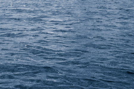 The texture of the waves on the surface of the water