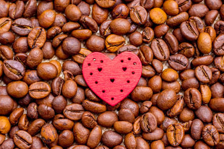Red heart on coffee beans. I love coffeeの写真素材