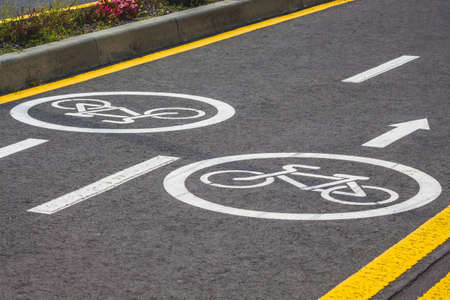 Bicycle asphalt track with markings in a modern European resortの写真素材
