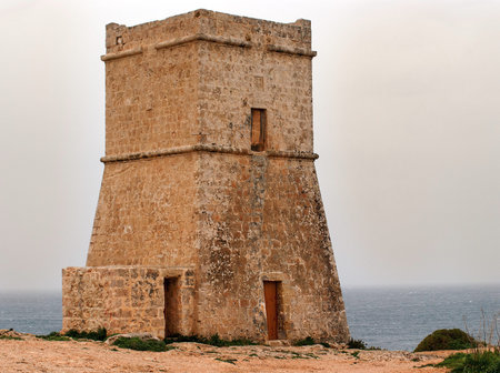 Maltese watch tower, built during the reign of the Knights of the Order of St John, is watching over...