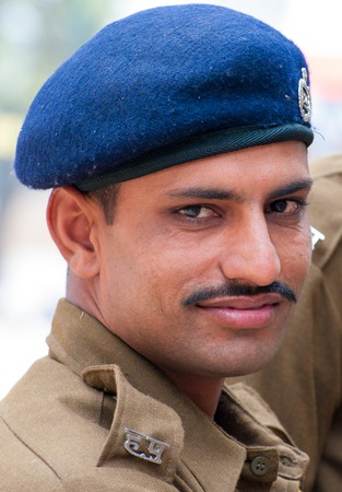 Unidentified policeman at  the annual Surajkund Fair on the outskirts of Delhi in Indiaのeditorial素材