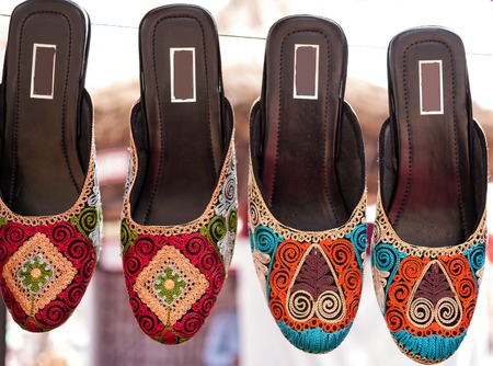 Colorful ethnic shoes on flea market in Indiaの写真素材