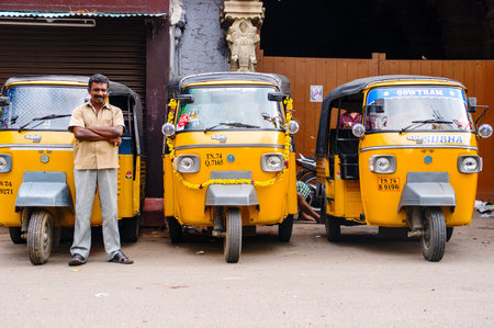 Trivandrum, India - December 11, 2011: Indian auto rickshaws in street. Auto rickshaws (called autos...