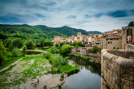 View of medieval town with castle and bridge. Besalu, Cataloniaのeditorial素材
