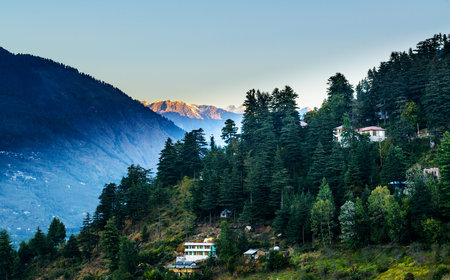 Sunrise in Kulu valley with Himalayas range in background