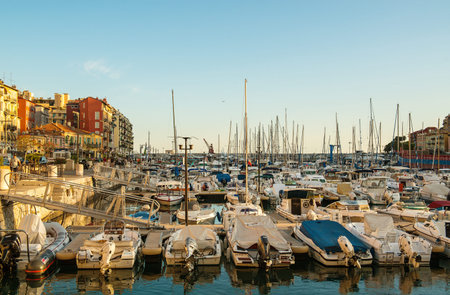 Nice, France - August 07, 2016: Port of Nice at sunset full of yachts and boatsのeditorial素材