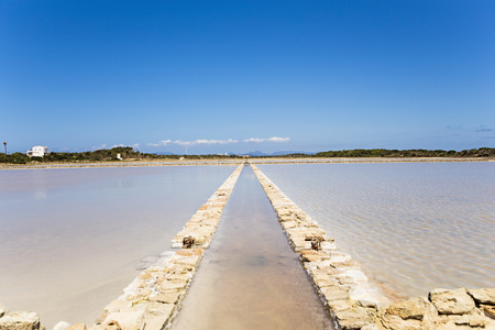 Pools of water for the saltworks in Formentera Ses Salinesの写真素材